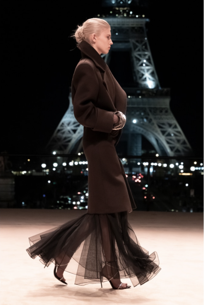 Yves Saint Laurent sends silky evening gowns down Eiffel Tower runway