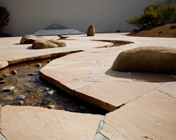 Completed in 1982, this 1.6-acre quiet retreat by the world-renown Isamu Noguchi is one of the most important large outdoor sculptures in Southern California. Six elements of the state’s landscape are depicted along with 15 granite rocks composed to form “The Spirit of the Lima Bean,” an homage to the land’s agricultural heritage. Commissioned by Henry Segerstrom and the Segerstrom Family.